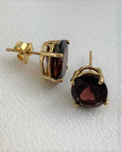 Load image into Gallery viewer, Garnet earrings oval shaped set on 14 KT yellow gold
